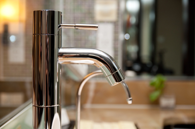 Leaking tap being repaired in Dagenham